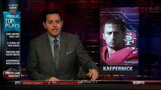 Illustration for article titled ESPN Uses "Street Clothes" Photo Of Kaepernick, Then Decides Otherwise